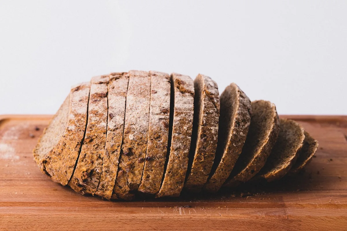 Fresh loaves in linen bread basket