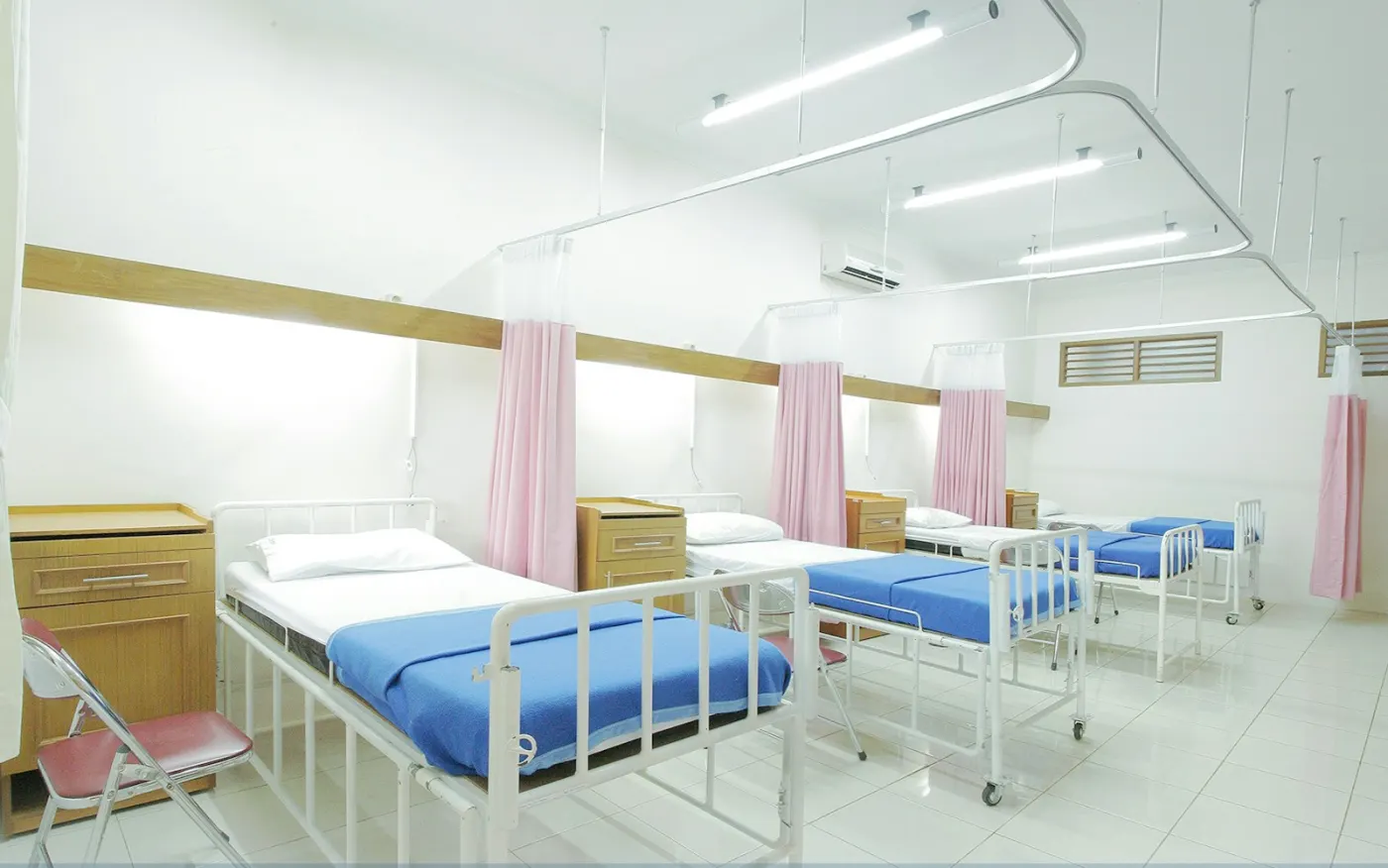 Bright, serene medical consultation suite with natural window light